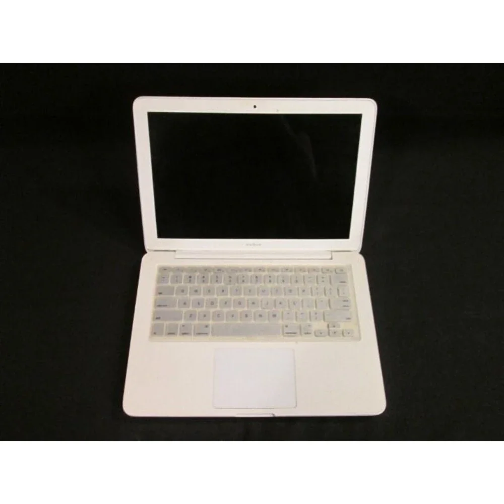 White Macbook With Keyboard Skin